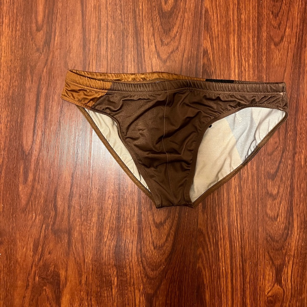 Charlie by Matthew Zink earth tones colored speedo with logo. Worn once!